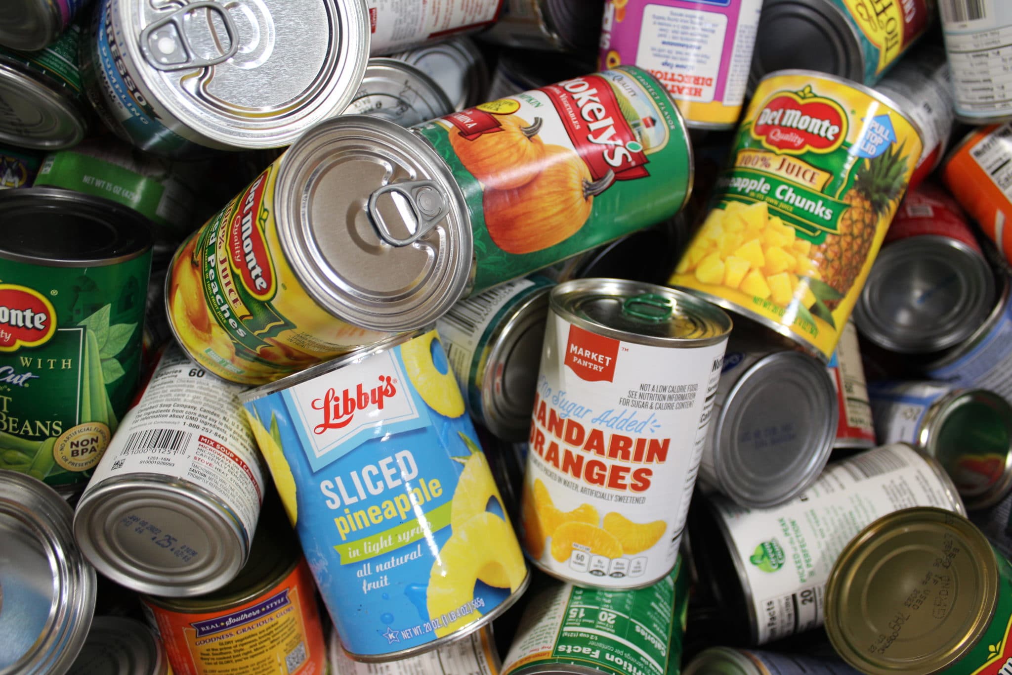 Collection of various tins canned goods food metal