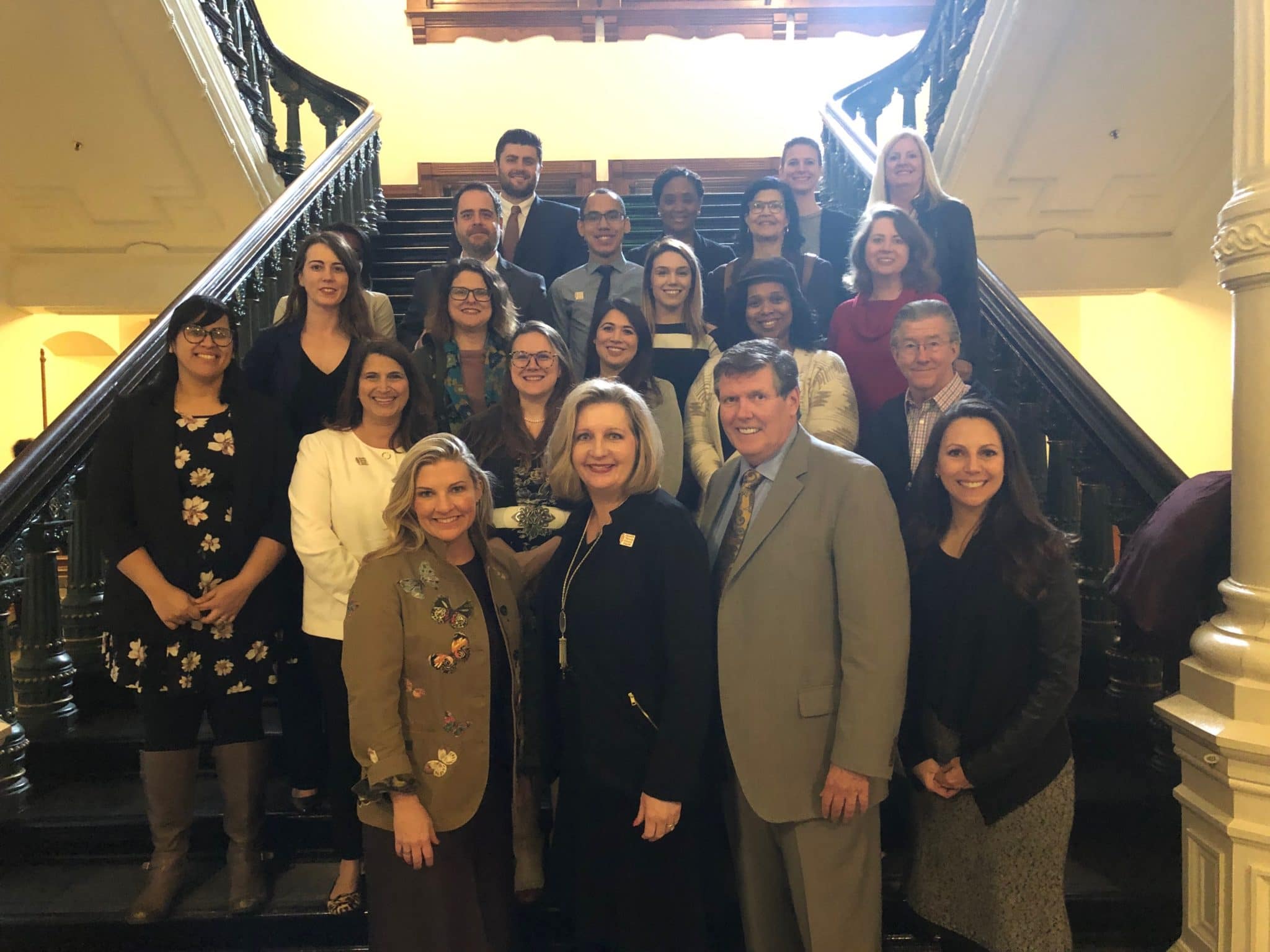 North Texas Food Bank Advocates posing on a staircase at the state capitol