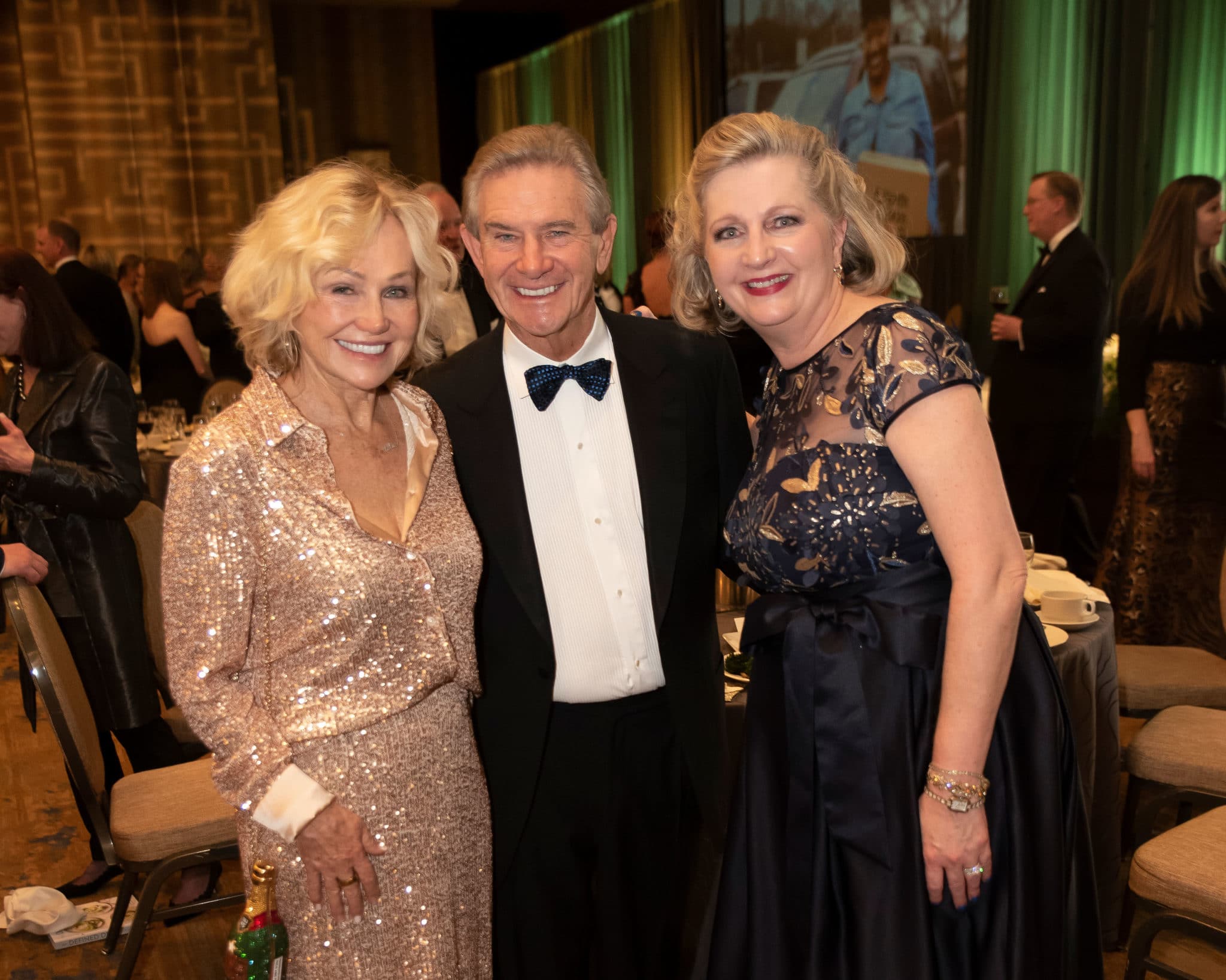 North Texas Food Bank founder, Kathryn Hall with her husband, Craig Hall, and NTFB President and CEO, Trisha Cunningham