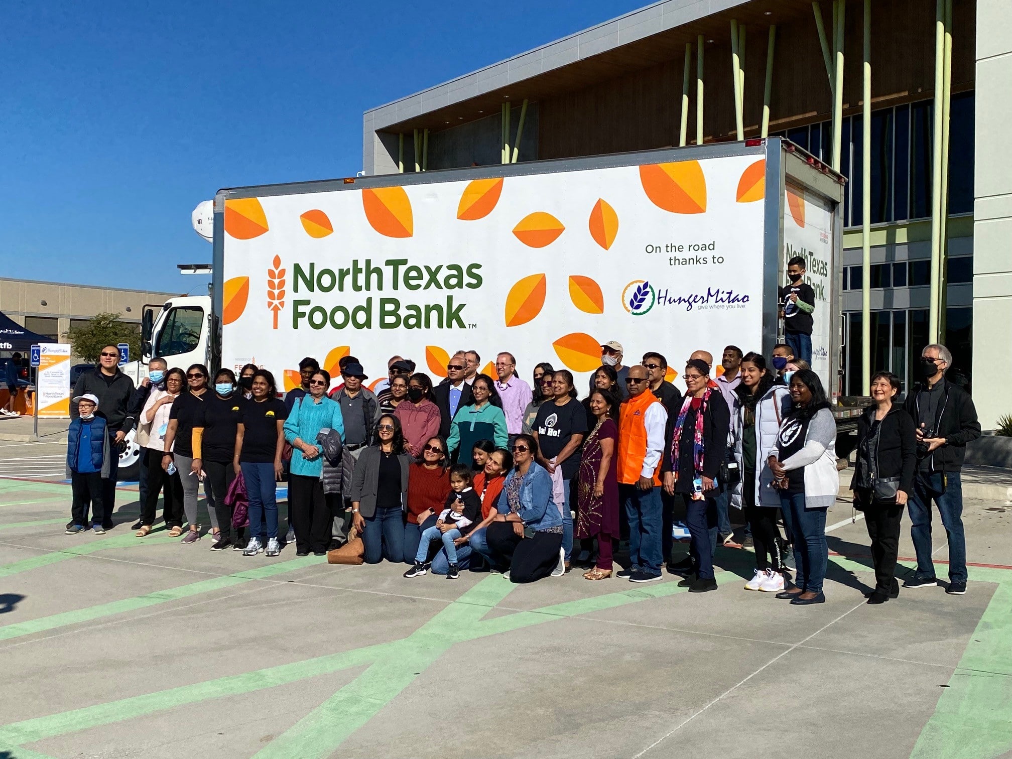 HungerMitao members standing in front of a North Texas Food Bank truck