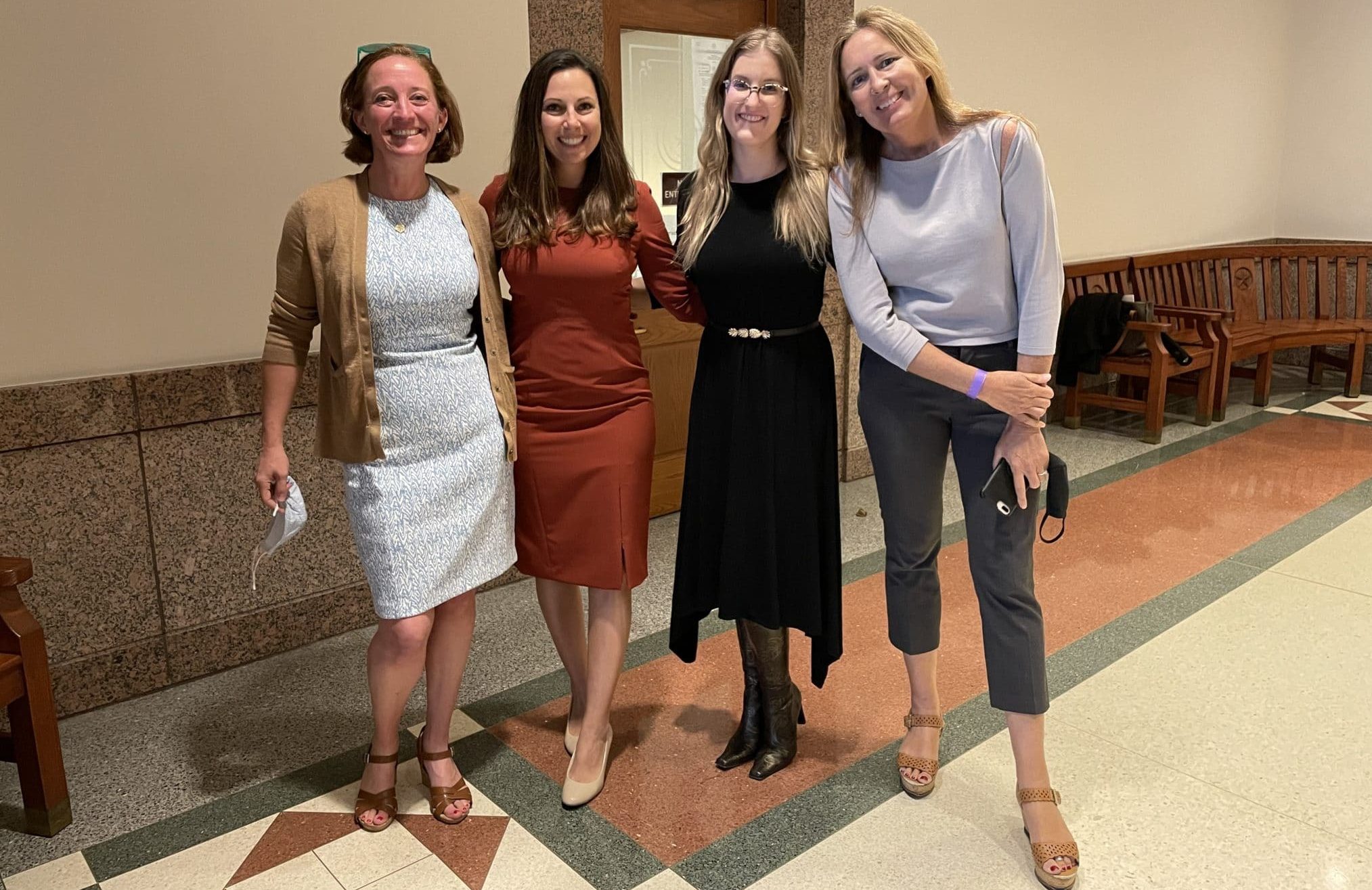 Four women inside the Texas State Capitol Building. From left to right: Beth Corbett, Central Texas Food Bank Director of Advocacy and Public Policy, Valerie Hawthorne, North Texas Food Bank Director of Government Relations, Jamie Olson, Feeding Texas Director of Policy and Advocacy, and Celia Cole, Feeding Texas CEO