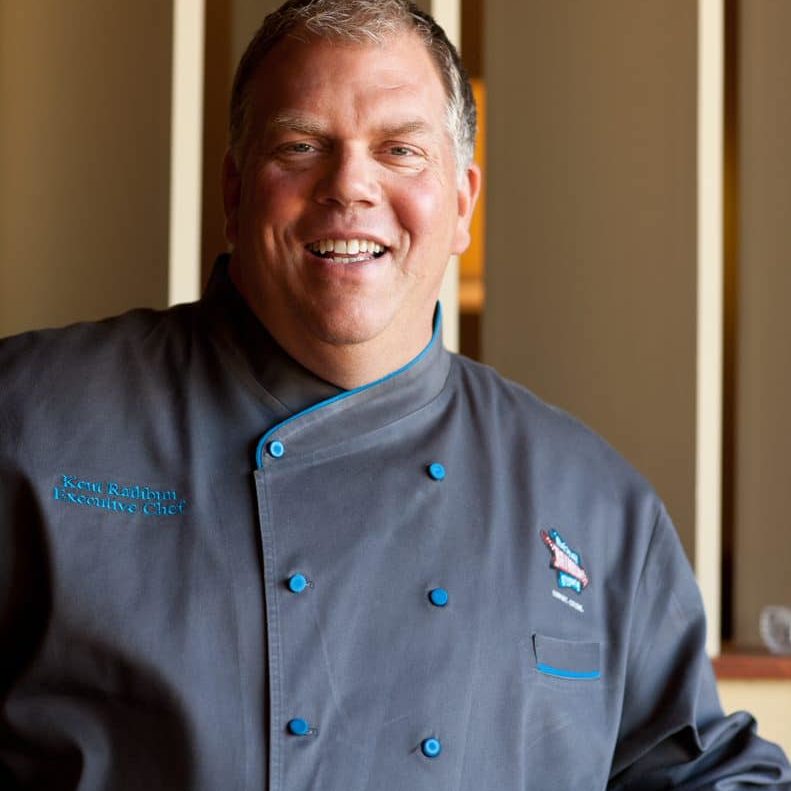 Chef Kent Rathbun in a dark blue Chef's jacket